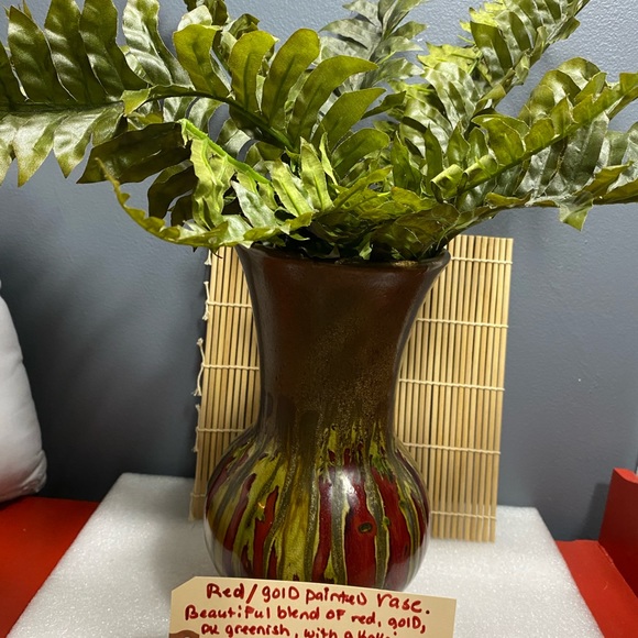 This is a beautiful red, vase with various colors of yellow and khaki running - Picture 3 of 6
